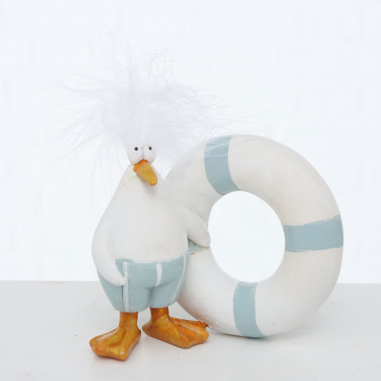 Deko Figur maritim Beppie mit Schwimmring Kunstharz H 12cm